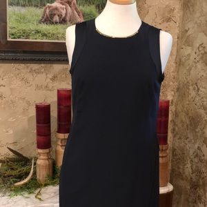 Micheal Kors sleeveless dress with the gold trim